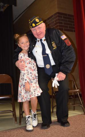 Veteran Craig Larson and his great granddaughter Navy