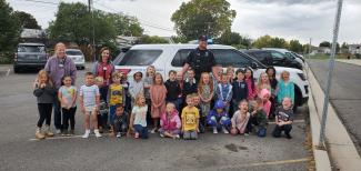 Officer Olson with kindergarten students