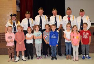 Veterans with 1st grade students